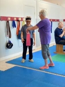 Man and woman passing a gift